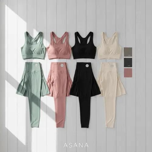 Flat lay of coordinated yoga wear capsule collection in a cohesive minimalist color palette with fabric swatches
